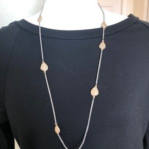 Silver tone necklace with gold accents